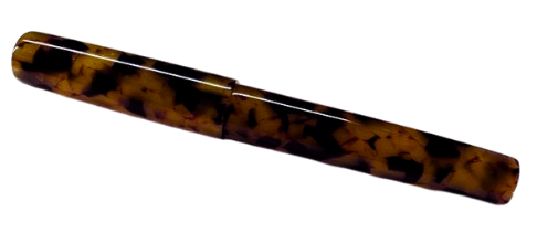 Tortoiseshell hair clip on a white background